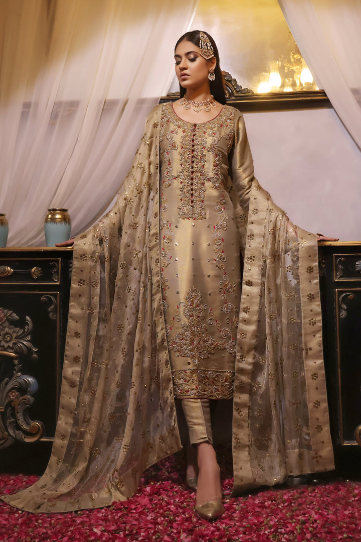 Step into elegance with Palwasha, a long shirt crafted from lamba shimmer tissue adorned with intricate zardozi handwork. Complete with a pure tissue .