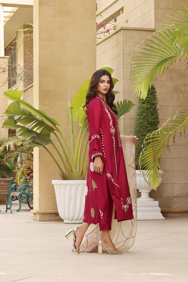 Radiate elegance in CRIMSON. Fusia pink sheesha silk with resham embroidery, diamonte, pearl work, and organza dupatta. Choose pants and shalwar.