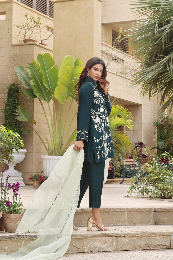 Dazzle in EMERALD, sheesha silk with intricate embroidered stitches and hand-embellished diamonte work. Elevate your elegance this Eid .