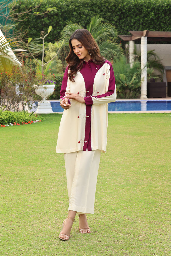 Embrace the charm of COCO. Cotton net with pearls, Swarovski work, radiant stones in a chic front open style. Choose palazzo or straight pants for Eid.