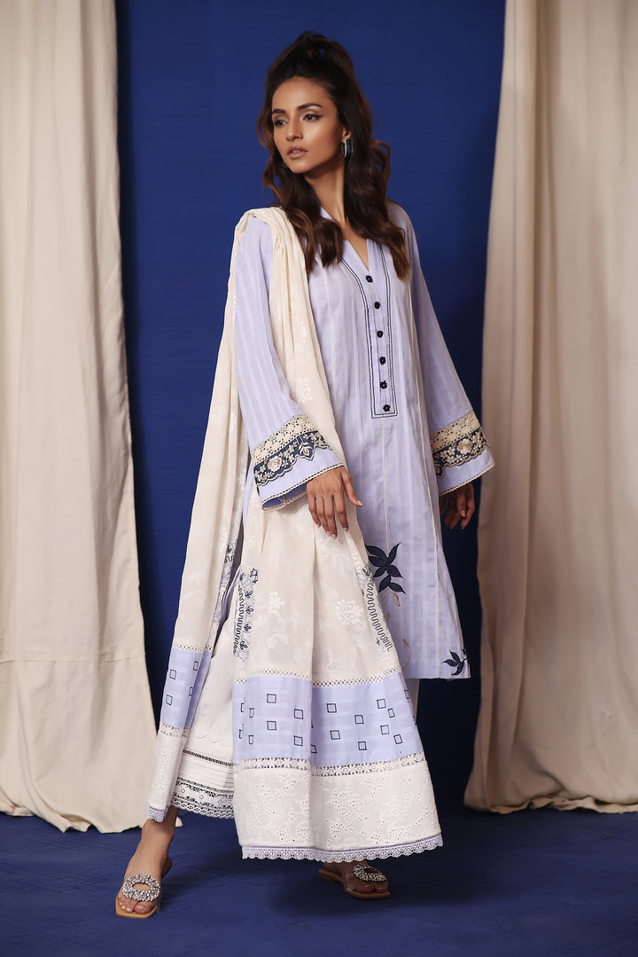  Explore Mona Imran's Naya Collection: The perfect summer fashion with embossed lawn, cotton net, applique work, and resham embroidery.