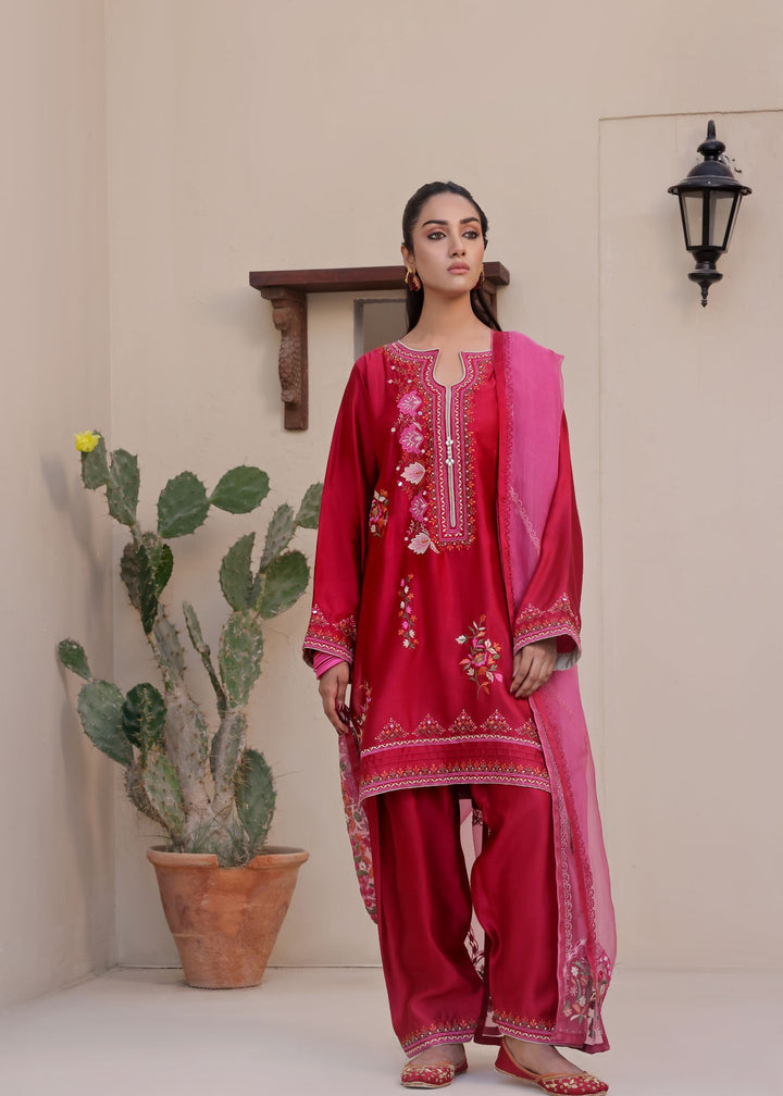 Elevate your wardrobe with BAHAAR. Mona Imran's stunning embroidered outfit with multi-colour resham and delicate stone work. Ideal for captivating elegance.