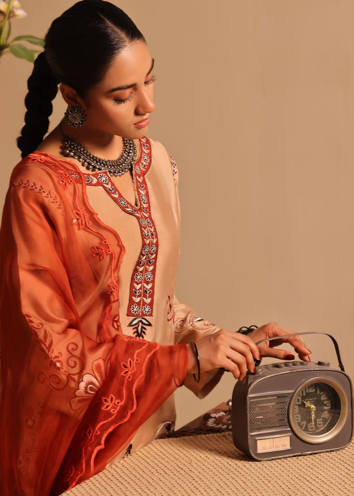  Discover Maya by Mona Imran, featuring intricate Kashmiri handwork on the neckline, daman, sleeves, and back for an elegant look.