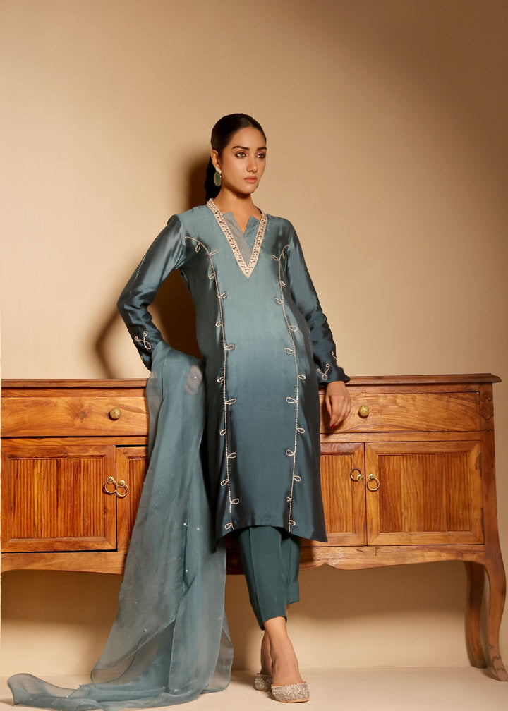  Introducing ARZU by MONA IMRAN. Elegant long-length panelled shirt with intricate neckline applique and delicate stone embellishments. Ideal for all occasions.